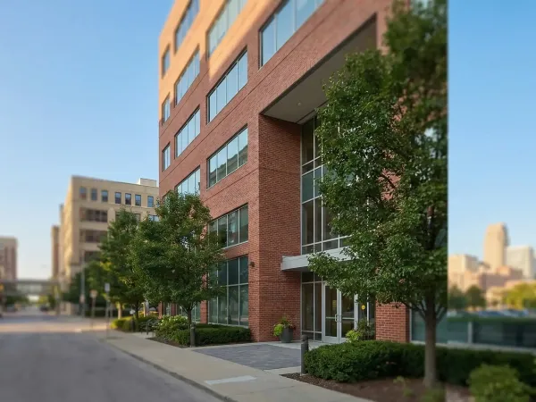 Professional law office consultation room with attorney and clients in Omaha, NE