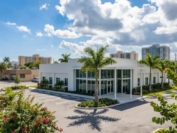 Healthcare professional consulting with a patient in a modern West Palm Beach medical clinic, FL