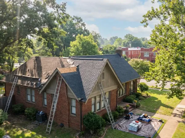 Professional roofer installing architectural shingles on a craftsman bungalow in Little Rock's Hillcrest neighborhood